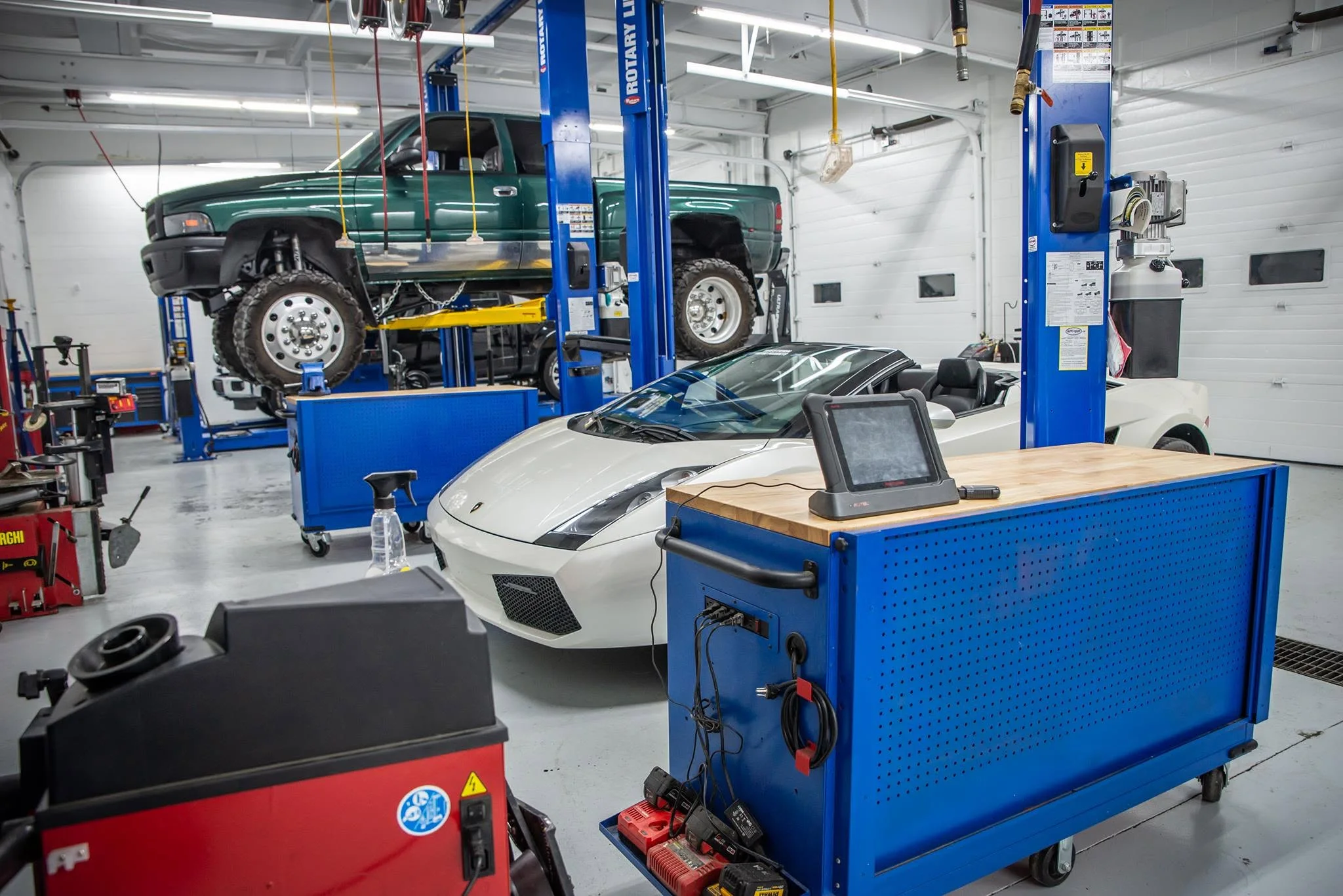 Western Gas and Diesel shop with performance car and lifted truck